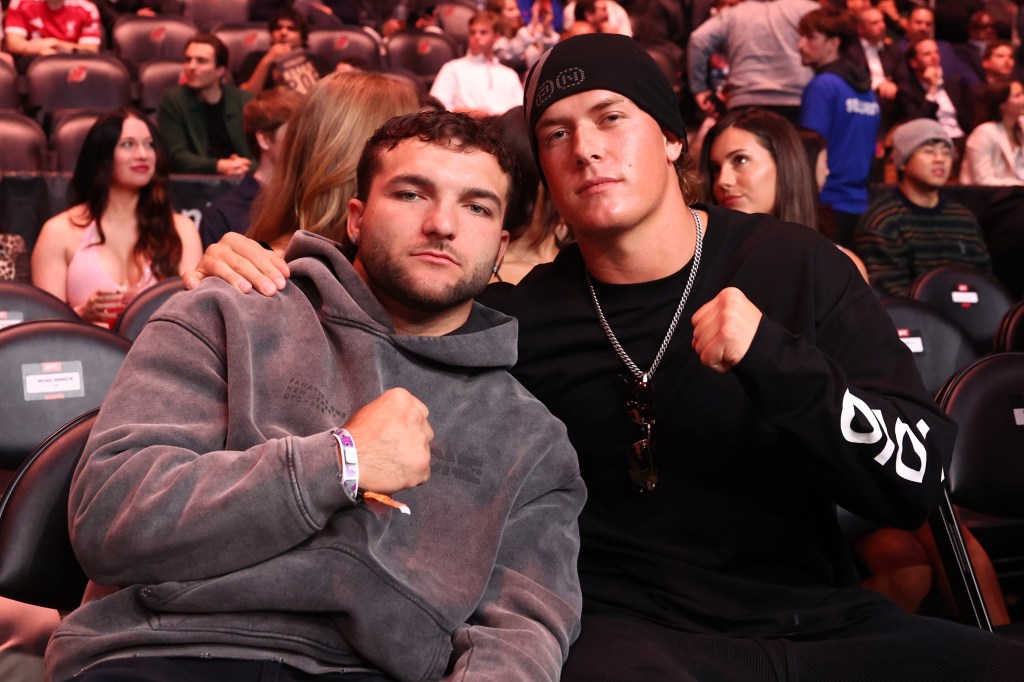 Cam Skattebo and Jaxson Dart are seen in attendance during the UFC 328 event at Prudential Center on May 09, 2026 in Newark, New Jersey.