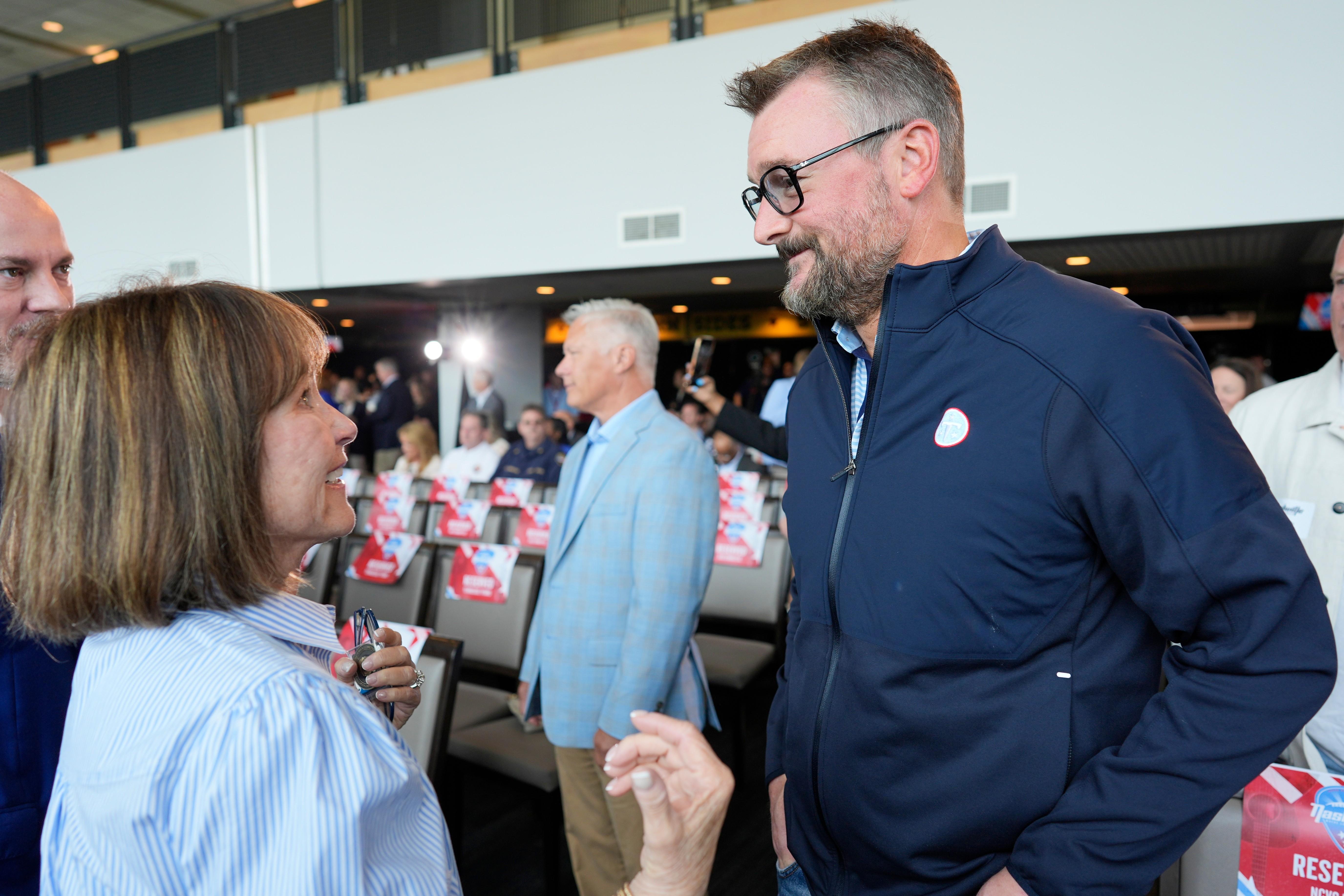 Tennessee Titans controlling owner Amy Adams Strunk, left, speaks with...