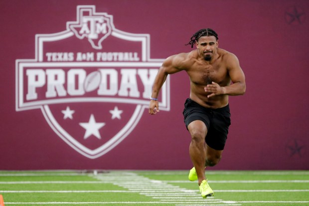 Texas A&M's Taurean York runs the 40 yard dash during the Texas A&M football pro day Wednesday, March 25, 2026, in College Station, Texas. (AP Photo/Michael Wyke)