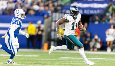 Nov 20, 2022; Indianapolis, Indiana, USA; Philadelphia Eagles wide receiver A.J. Brown (11) runs with the ball while Indianapolis Colts linebacker Zaire Franklin (44) defends in the first quarter at Lucas Oil Stadium.