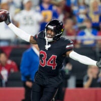 Oct 21, 2024; Glendale, Arizona, USA; Arizona Cardinals safety Jalen Thompson (34) celebrates after recovering a fumble from the Los Angeles Chargers in the first half at State Farm Stadium.