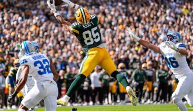 Green Bay Packers tight end Tucker Kraft (85) makes a catch for a touchdown against Detroit Lions safety Brian Branch (32) during the first half at Lambeau Field in Green Bay, Wis., on Sunday, September 7, 2025.