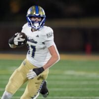 Choctaw's Titus Hawk runs after a reception during the Class 6A-II high school football championship game between Choctaw and Sand Springs at Chad Richison Stadium in Edmond, Okla., Friday, Dec. 5, 2025.