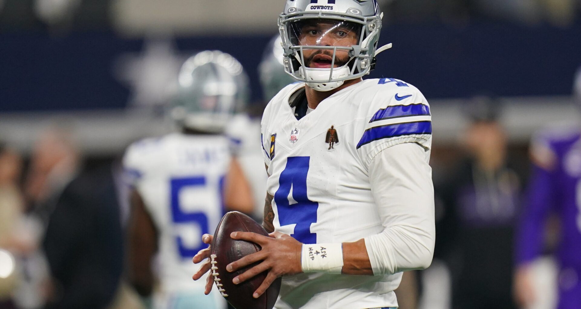 Dec 14, 2025; Arlington, Texas, USA; Dallas Cowboys quarterback Dak Prescott (4) warms up before a game against the Minnesota Vikings at AT&T Stadium.