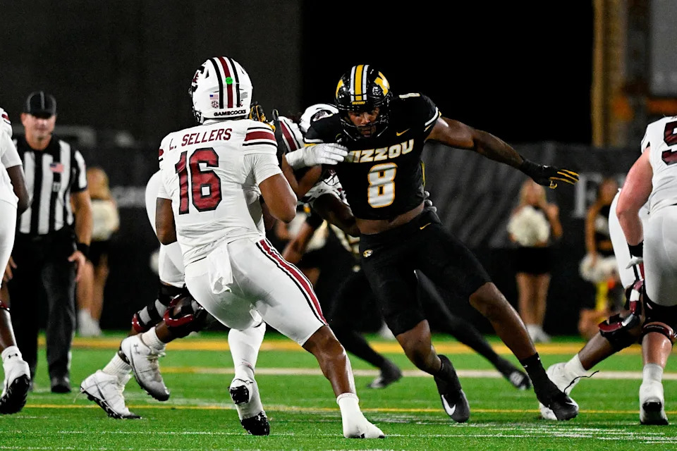 Damon Wilson II of the Missouri Tigers pressures LaNorris Sellers of the South Carolina Gamecocks