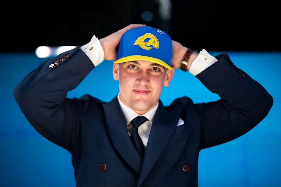 Alabama quarterback Ty Simpson reacts as he puts on a hat after being chosen 13th overall by the Los Angeles Rams in the tunnel during the first round NFL football draft at Acrisure Stadium on April 23, 2026 in Pittsburgh, Pennsylvania. (Photo by Michael Owens/Getty Images)