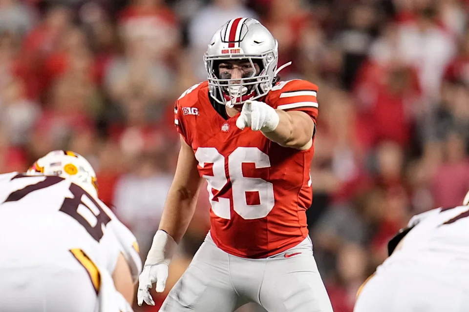 Ohio State Buckeyes linebacker Payton Pierce (26) motions during the NCAA football game against the Minnesota Golden Gophers at Ohio Stadium in Columbus on Oct. 4, 2025.