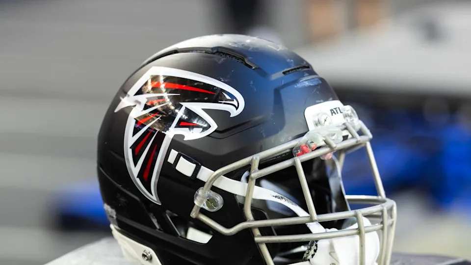 Detailed view of an Atlanta Falcons helmet at State Farm Stadium. Mark J. Rebilas-Imagn Images