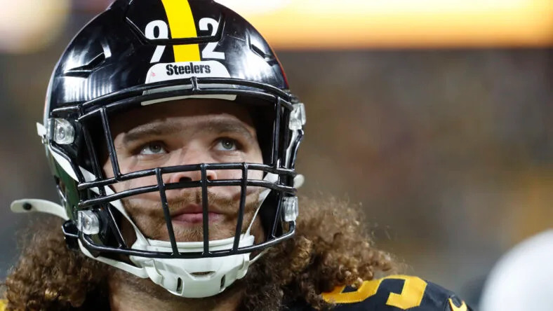Isaiahh Loudermilk stands on the sideline during a Steelers home game against the Patriots at Acrisure Stadium.