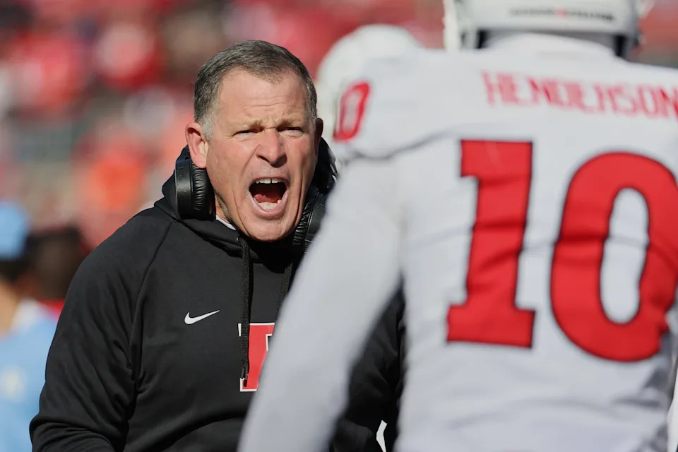 Nov 22, 2025; Columbus, Ohio, USA; Rutgers Scarlet Knights head coach Greg Schiano celebrates with Rutgers Scarlet Knights defensive back Jacobie Henderson (10) (obscured) against the Ohio State Buckeyes during the second quarter at Ohio Stadium. Mandatory Credit: Joseph Maiorana-Imagn Images