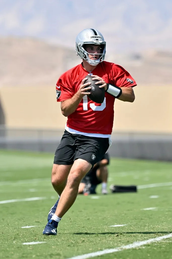 Fernando Mendoza looks to pass during the team’s rookie <br>minicamp May 2. Getty Images