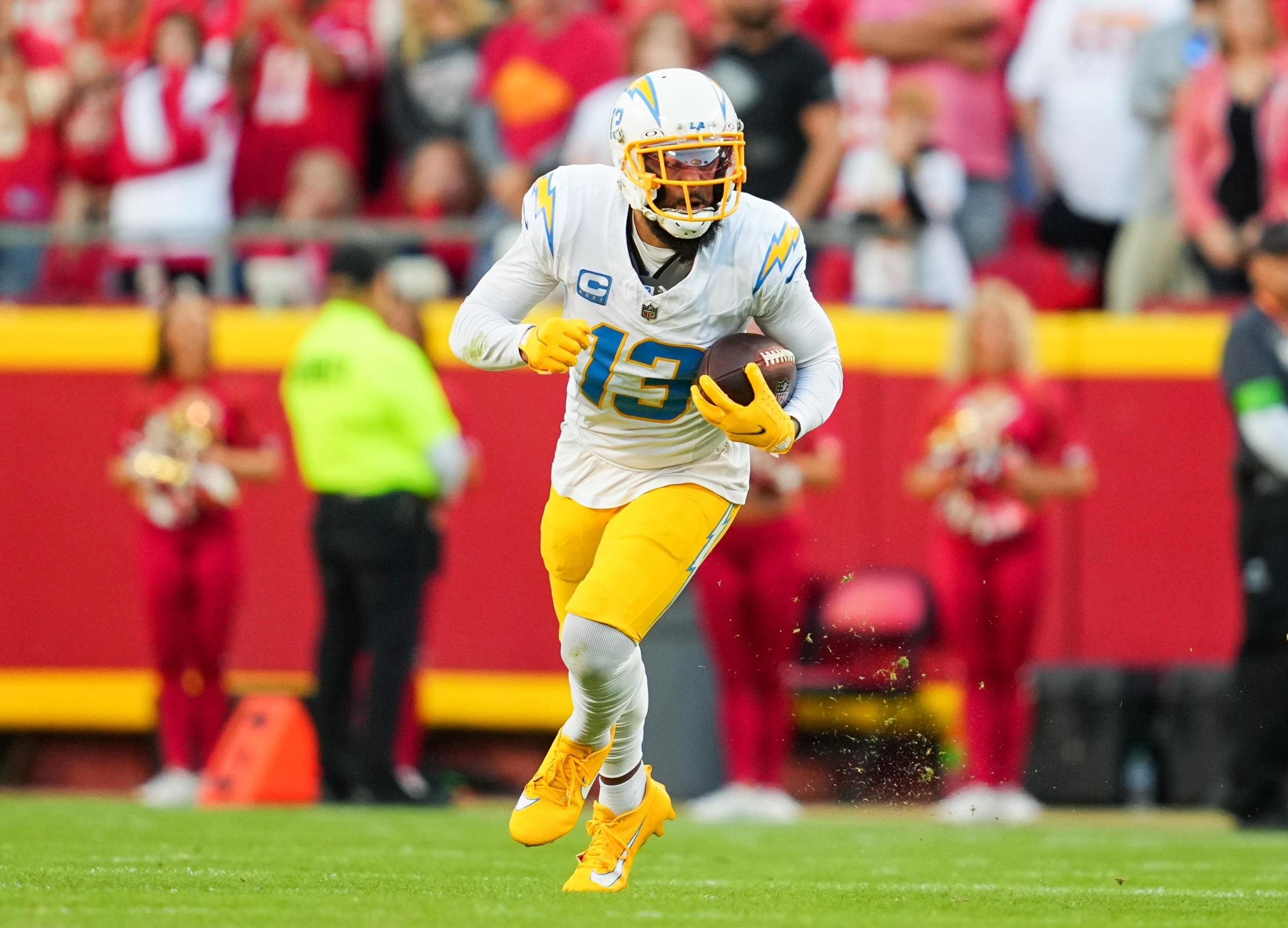 Oct 22, 2023; Kansas City, Missouri, USA; Los Angeles Chargers wide receiver Keenan Allen (13) runs with the ball during the second half against the Kansas City Chiefs at GEHA Field at Arrowhead Stadium. Mandatory Credit: Jay Biggerstaff-Imagn Images