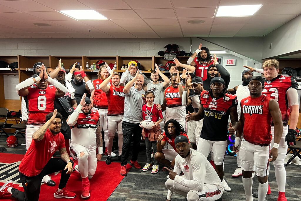 football players in a locker room