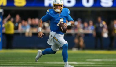 Los Angeles Chargers quarterback Taylor Heinicke (4) throws the ball against the Los Angeles Rams in the first half at SoFi Stadium.