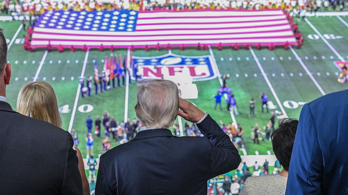 President Donald Trump speaking at a podium