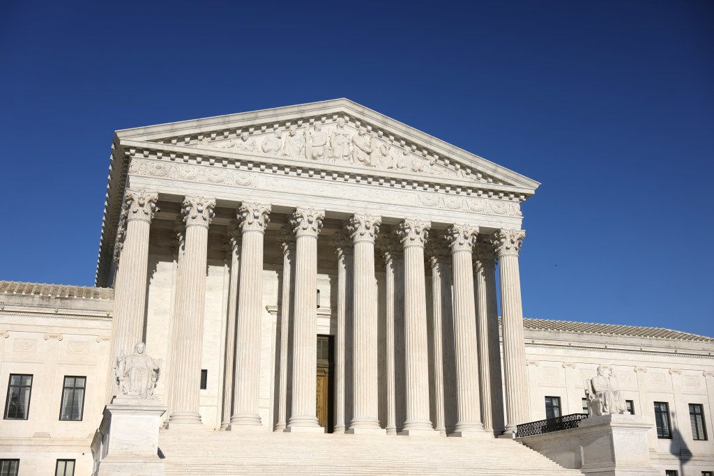 The front facade of the US Supreme Court building.