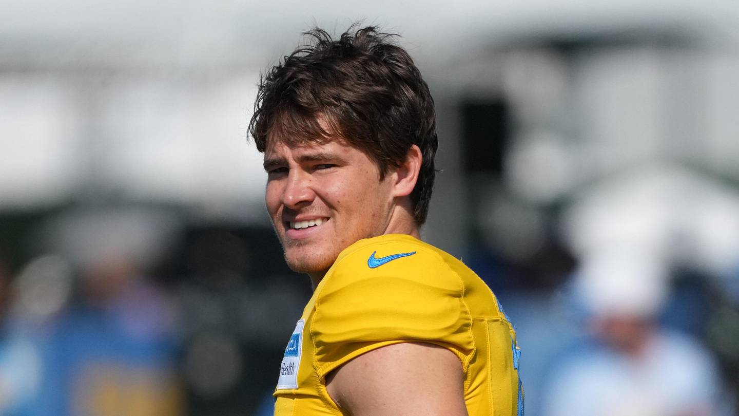 Aug 7, 2025; El Segundo, CA, USA; Los Angeles Chargers quarterback Justin Herbert (10) reacts during training camp at The Bolt. Mandatory Credit: Kirby Lee-Imagn Images