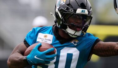 Jacksonville Jaguars running back J'Mari Taylor (30) hits a blocking pad during rookie minicamp at the Miller Electric Center, Saturday, May 9, 2026 in Jacksonville, Fla.