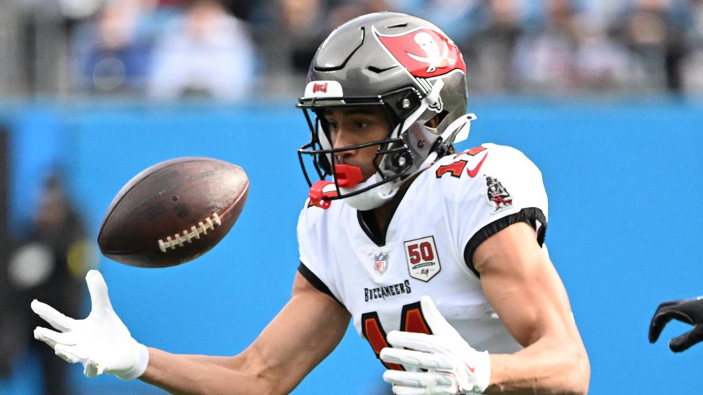 Dec 21, 2025; Charlotte, North Carolina, USA;  Tampa Bay Buccaneers wide receiver Jalen McMillan (11) catches the ball in the first quarter at Bank of America Stadium. Mandatory Credit: Bob Donnan-Imagn Images