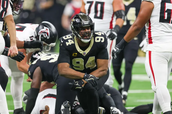 Nov 23, 2025; New Orleans, Louisiana, USA; New Orleans Saints defensive end Cameron Jordan (94) reacts after forcing a fumble against the Atlanta Falcons during the first half at Caesars Superdome. Mandatory Credit: Stephen Lew-Imagn Images