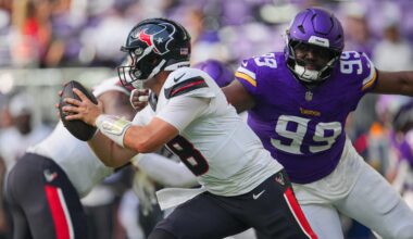 Aug 9, 2025; Minneapolis, Minnesota, USA; Houston Texans wide receiver John Metchie III (8) evades Minnesota Vikings defensive end Elijah Williams (99) in the fourth quarter at U.S. Bank Stadium.