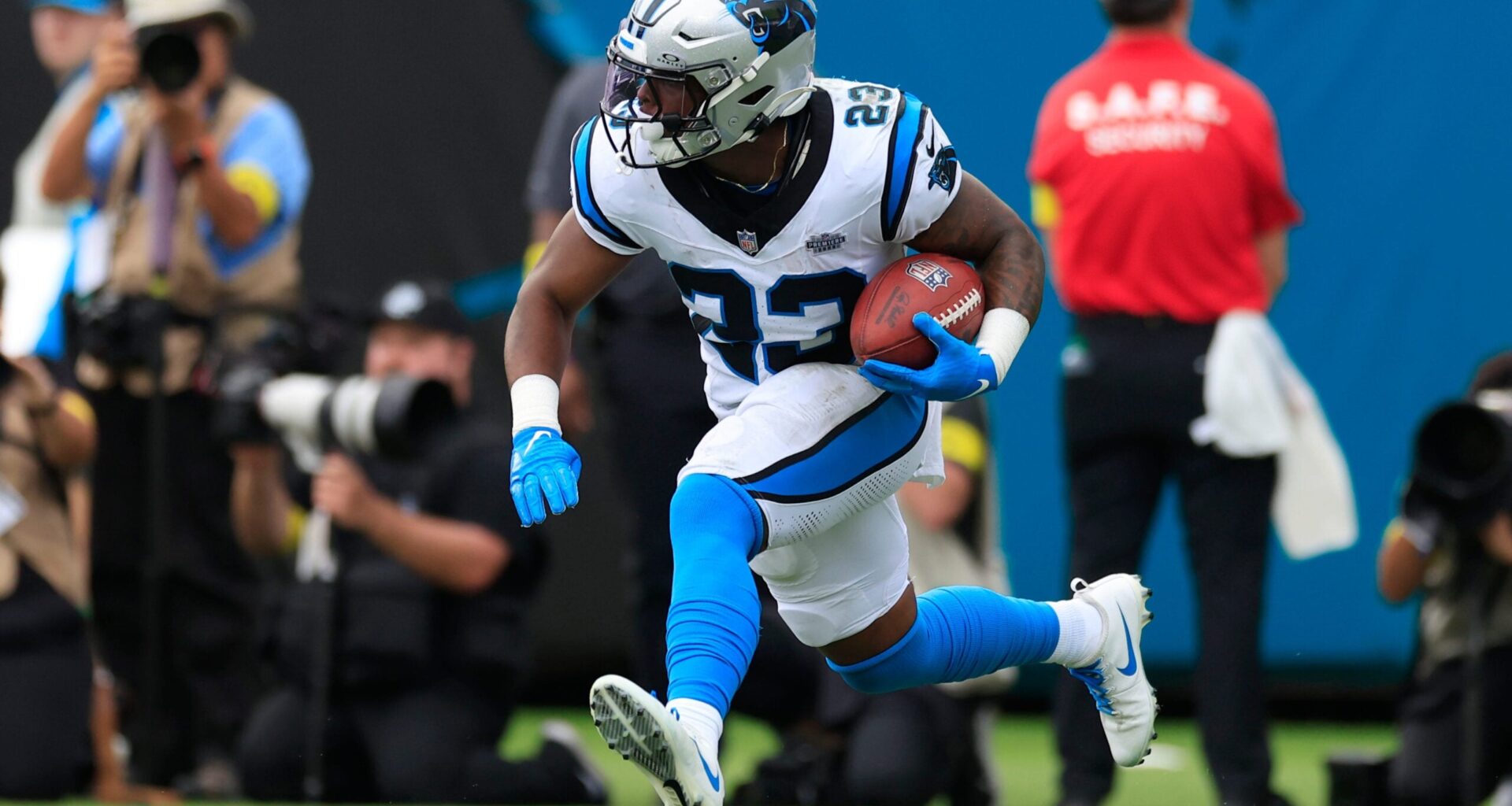 Carolina Panthers running back Trevor Etienne (23) returns a kickoff during the second quarter of an NFL football matchup at EverBank Stadium, Sunday, Sept. 7, 2025 in Jacksonville, Fla.