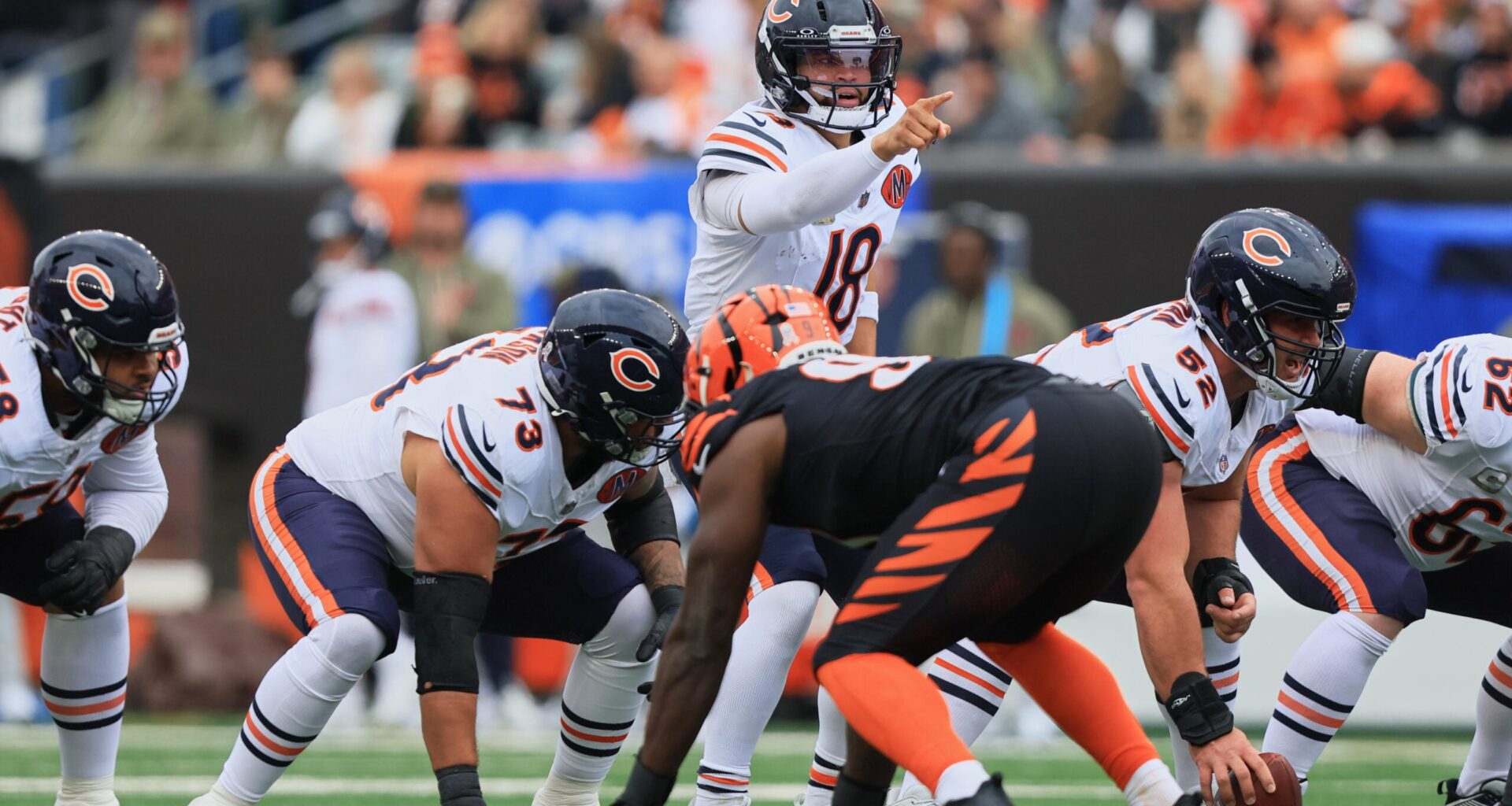 Nov 2, 2025; Cincinnati, Ohio, USA; Chicago Bears quarterback Caleb Williams (18) gestures toward the Cincinnati Bengals defense at the line of scrimmage during the first quarter at Paycor Stadium.