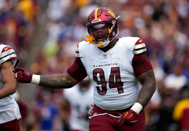 Daron Payne #94 of the Washington Commanders reacts while playing against the New York Giants during the game at Northwest Stadium on September 07, 2025 in Landover, Maryland.