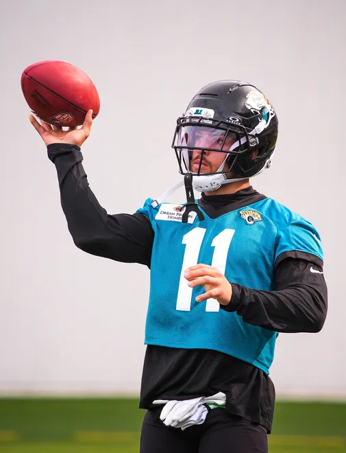 Jaguars wide receiver Parker Washington (11) throws the ball after catching punts during the Jaguarsâ€™ fourth OTA of the year, Monday June 1, 2026 at the Miller Electric Center in Jacksonville, Fla. [Doug Engle/Florida Times-Union]