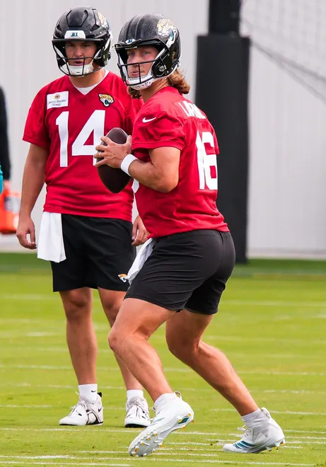 Jaguars quarterback Trevor Lawrence (16) drops back to pass while running drills during the Jaguarsâ€™ fourth OTA of the year, Monday June 1, 2026 at the Miller Electric Center in Jacksonville, Fla. [Doug Engle/Florida Times-Union]