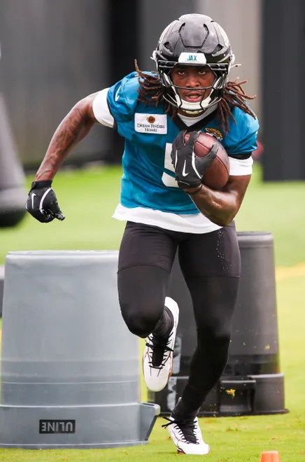 Jaguars running back LeQuint Allen Jr. (5) carries the ball during the Jaguarsâ€™ fourth OTA of the year, Monday June 1, 2026 at the Miller Electric Center in Jacksonville, Fla. [Doug Engle/Florida Times-Union]