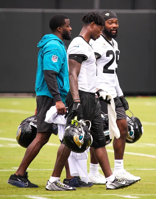 Jaguars safety Eric Murray (29) walks off the field with two of his teammates after the Jaguars held their fourth OTA of the year, Monday June 1, 2026 at the Miller Electric Center in Jacksonville, Fla. [Doug Engle/Florida Times-Union]