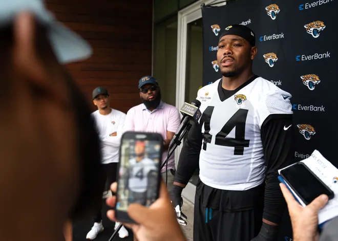 Jaguars defensive end Travon Walker (44) talks with the media after the Jaguars held their fourth OTA of the year, Monday June 1, 2026 at the Miller Electric Center in Jacksonville, Fla. [Doug Engle/Florida Times-Union]