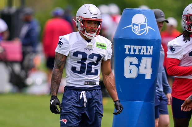 New England Patriots running back TreVeyon Henderson during an OTA practice, Wednesday, May 27, 2026, in Foxboro. (AP Photo/Charles Krupa)