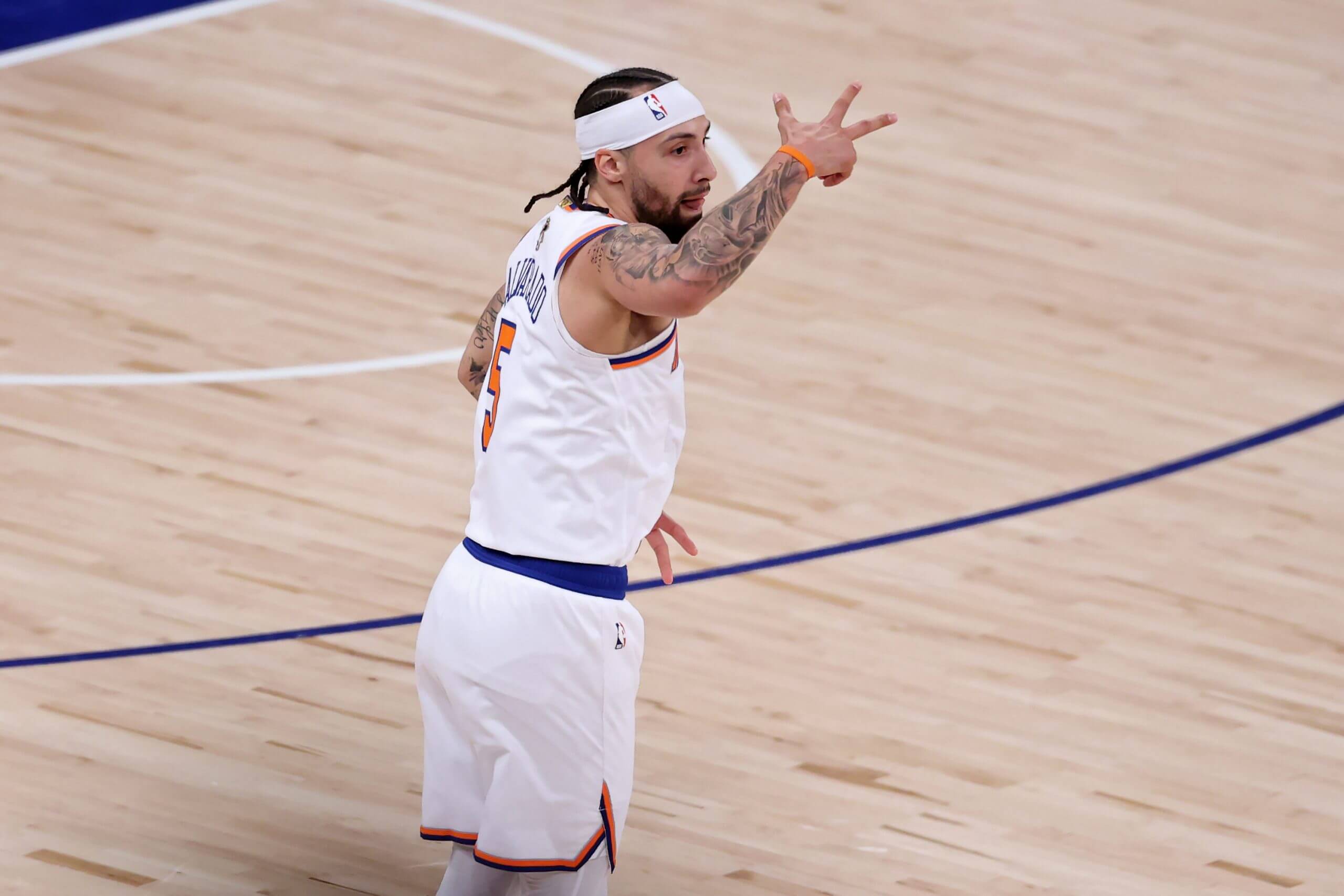  Jose Alvarado of the New York Knicks reacts after his three-point basket against the San Antonio Spurs during the fourth quarter in Game Four of the 2026 NBA Finals at Madison Square Garden.. 