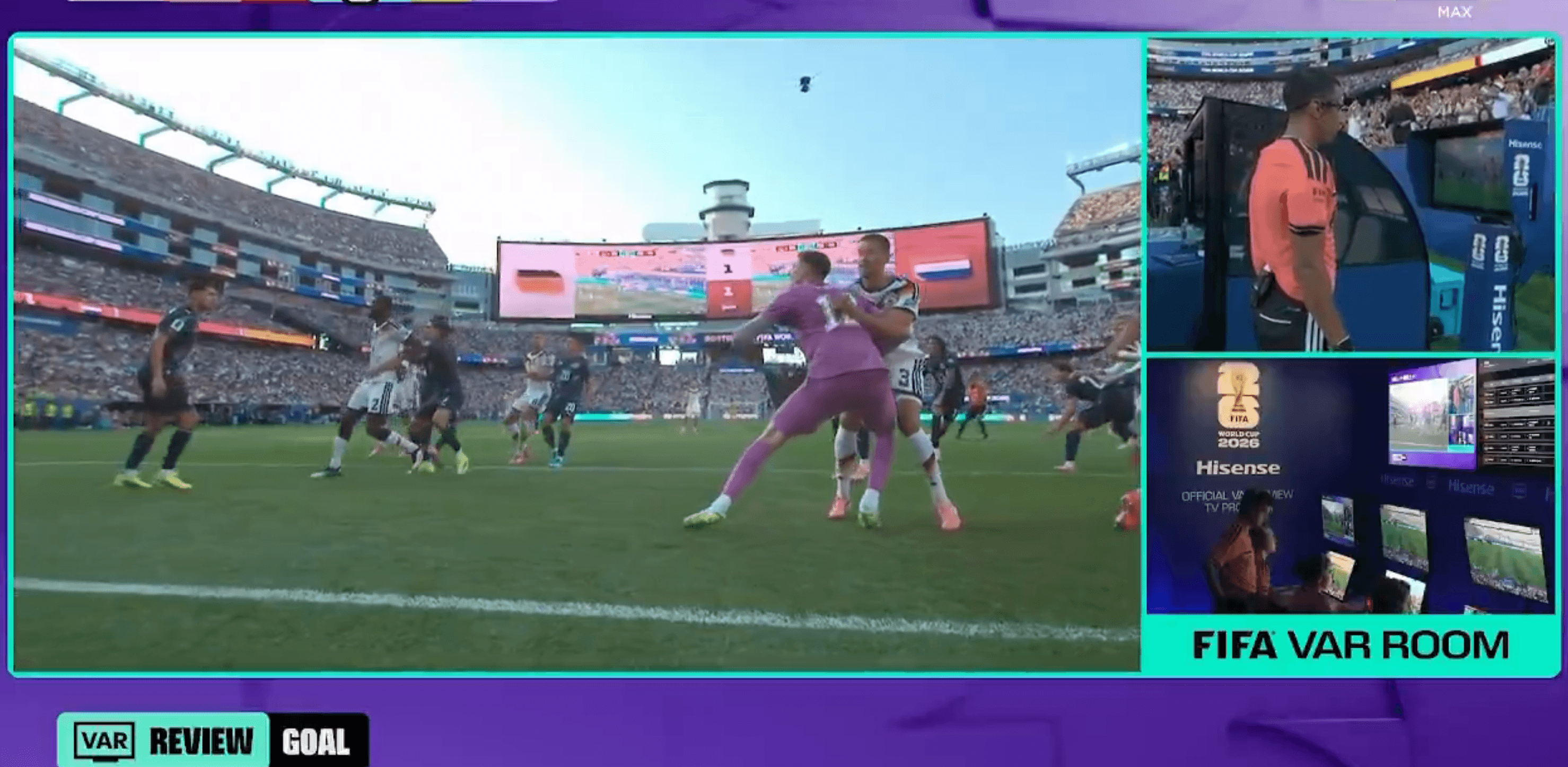 A still of television footage shows VAR reviewing contact between Germany's Waldemar Anton and Paraguay's Orlando Gill