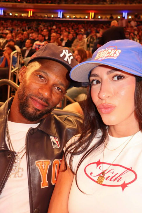 Victor Cruz and Orange Calderon at Game 4 of the NBA Finals.