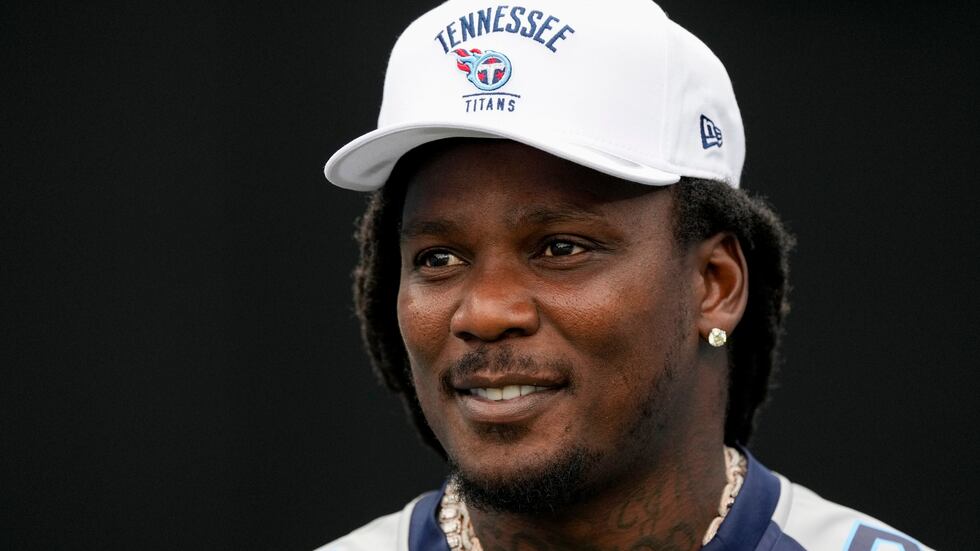 FILE - Former Tennessee Titans running back Chris Johnson visits the field during the second...