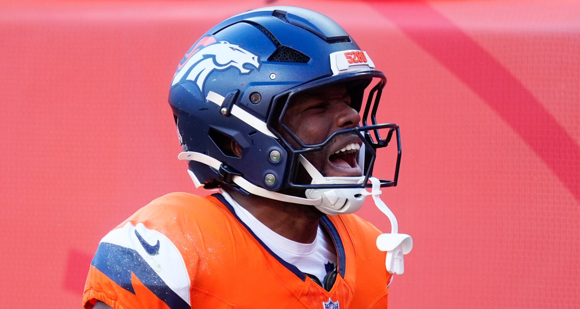 Nov 16, 2025; Denver, Colorado, USA; Denver Broncos wide receiver Marvin Mims Jr. (19) reacts after a punt return against the Kansas City Chiefs during the first quarter of the game at Empower Field at Mile High.