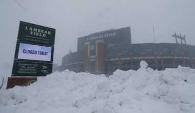 Snow falls around Lambeau Field on Sunday, March 15, 2026, in Green Bay, Wis. The storm is forecasted to drop approximately 16 inches of snow by the time it clears in the afternoon of March 16.