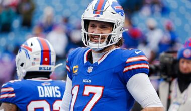 Buffalo Bills quarterback Josh Allen (17) smiles at something someone said before the Buffalo Bills wild card game against the Denver Broncos at Highmark Stadium in Orchard Park on Jan. 12, 2025.