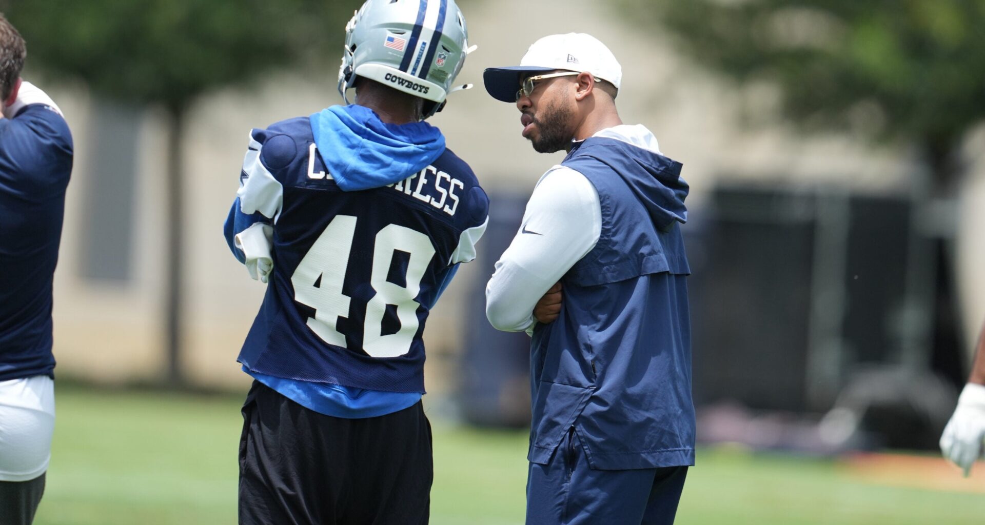 Jun 16, 2026; Dallas, TX, USA; Dallas Cowboys defensive coordinator Christian Parker speaks with cornerback Zion Childress (48) during practice at the Ford Center at the Star Training Facility in Frisco, Texas.