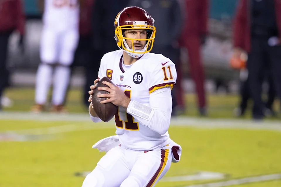 Alex Smith dropping back to pass as a member of the <a class="link " href="https://sports.yahoo.com/nfl/teams/washington/" data-i13n="sec:content-canvas;subsec:anchor_text;elm:context_link" data-ylk="slk:Washington Football Team;sec:content-canvas;subsec:anchor_text;elm:context_link;itc:0" data-yga="{"yLinkElement":"context_link","yModuleName":"content-canvas","yLinkText":"Washington Football Team","ySubModuleName":"anchor_text","yHasCommerce":false}">Washington Football Team</a>. Getty Images