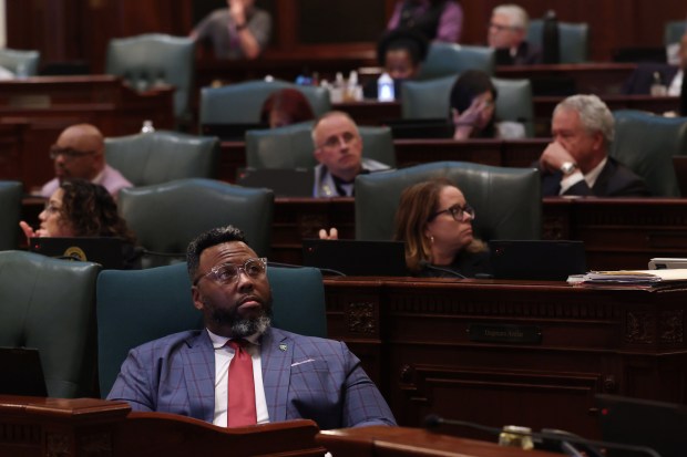 State Rep. Kam Buckner sits at his desk during the final night of the spring legislative session at the State Capitol on May 31, 2026, in Springfield. The Chicago Democrats is one of the lead negotiators on the Bears stadium issue. (John J. Kim/Chicago Tribune)
