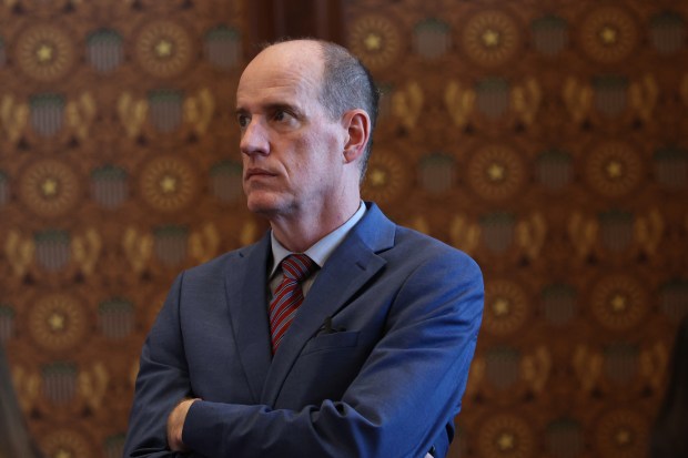 State Sen. Bill Cunningham stands in the Senate chamber during the spring legislative session at the State Capitol on May 28, 2026, in Springfield. (John J. Kim/Chicago Tribune)