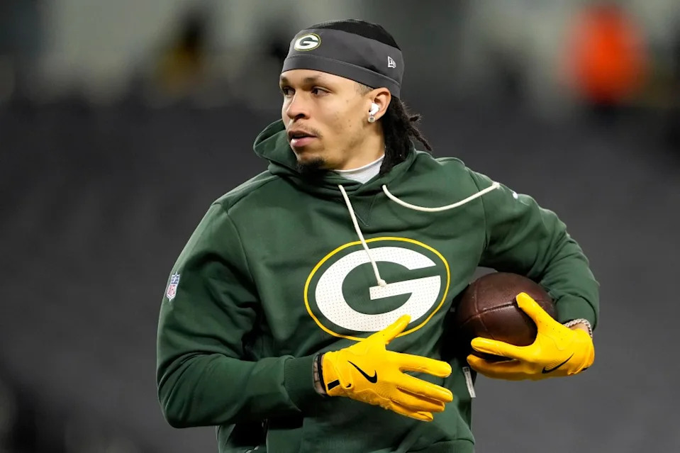 CHICAGO, ILLINOIS – JANUARY 10: Christian Watson #9 of the Green Bay Packers warms up before the game against the <a class="link " href="https://sports.yahoo.com/nfl/teams/chicago/" data-i13n="sec:content-canvas;subsec:anchor_text;elm:context_link" data-ylk="slk:Chicago Bears;sec:content-canvas;subsec:anchor_text;elm:context_link;itc:0" data-yga="{"yLinkElement":"context_link","yModuleName":"content-canvas","yLinkText":"Chicago Bears","ySubModuleName":"anchor_text","yHasCommerce":false}">Chicago Bears</a> in the NFC Wild Card Playoff game at Soldier Field on January 10, 2026 in Chicago, Illinois. (Photo by Patrick McDermott/Getty Images)