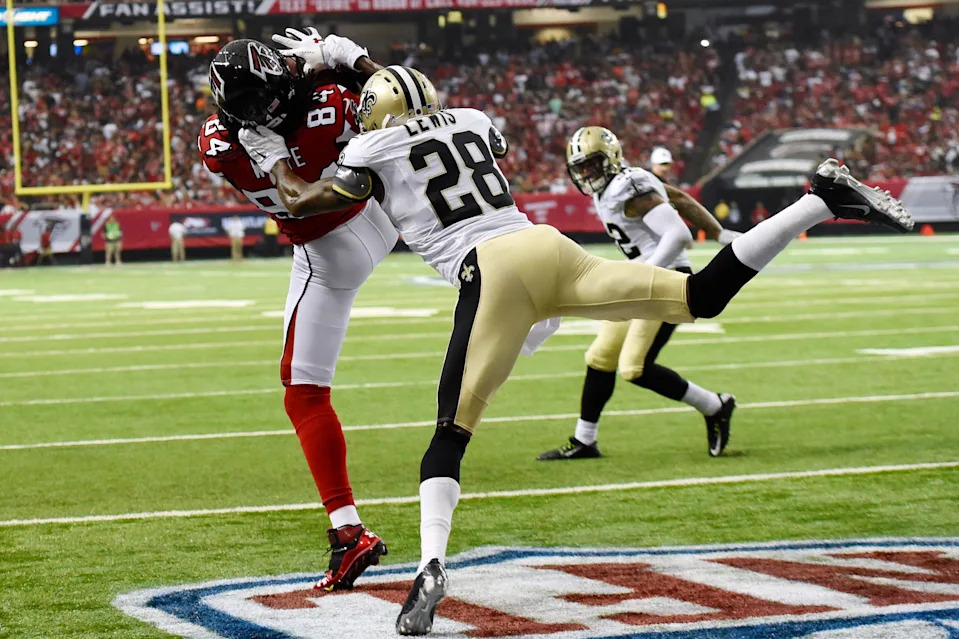 Sep 7, 2014; Atlanta, GA, USA; Atlanta Falcons wide receiver Roddy White (84) catches a touchdown pass in front of New Orleans Saints cornerback Keenan Lewis (28) during the second quarter at the Georgia Dome. Mandatory Credit: Dale Zanine-USA TODAY Sports