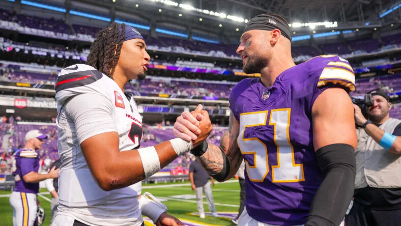 Texans quarterback C.J. Stroud and Vikings linebacker Blake Cashman meet after a game in Minneapolis. Vikings Pro Bowl