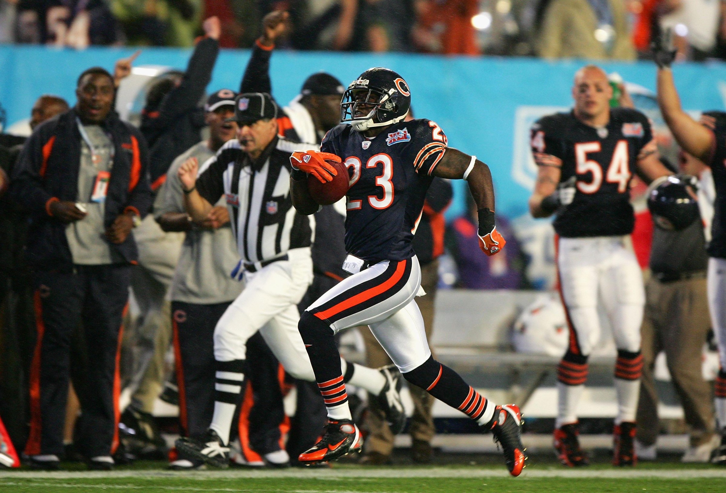 MIAMI GARDENS, FL - FEBRUARY 04: Kick returner Devin Hester #23 of the Chicago Bears returns the opening kickoff 92-yards for a touchdown against the Indianapolis Colts in the first quarter of Super Bowl XLI on February 4, 2007 at Dolphin Stadium in Miami Gardens, Florida. (Photo by Jed Jacobsohn/Getty Images)