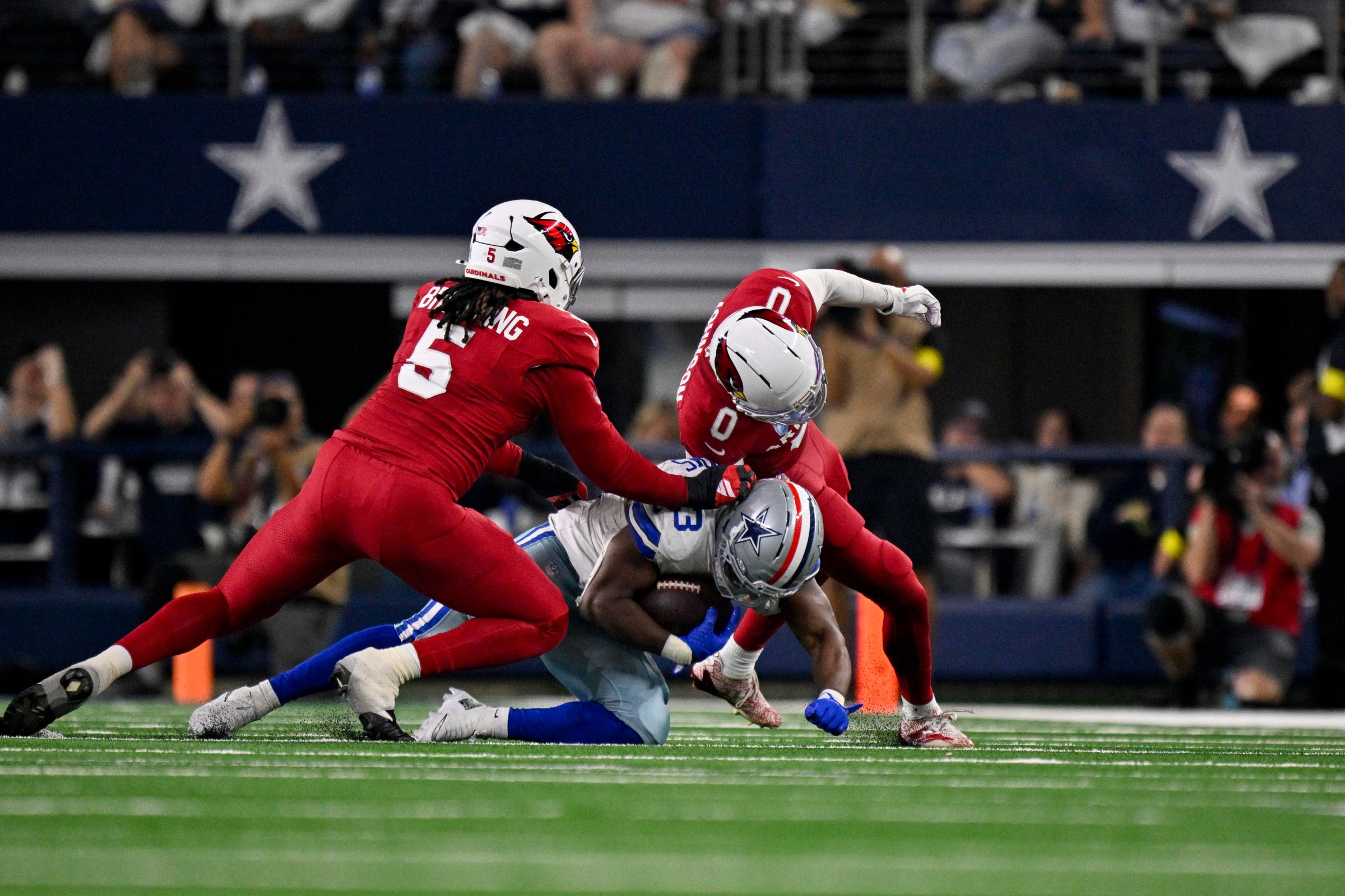 Cardinals linebacker Baron Browning (5) and cornerback Will Johnson (0)